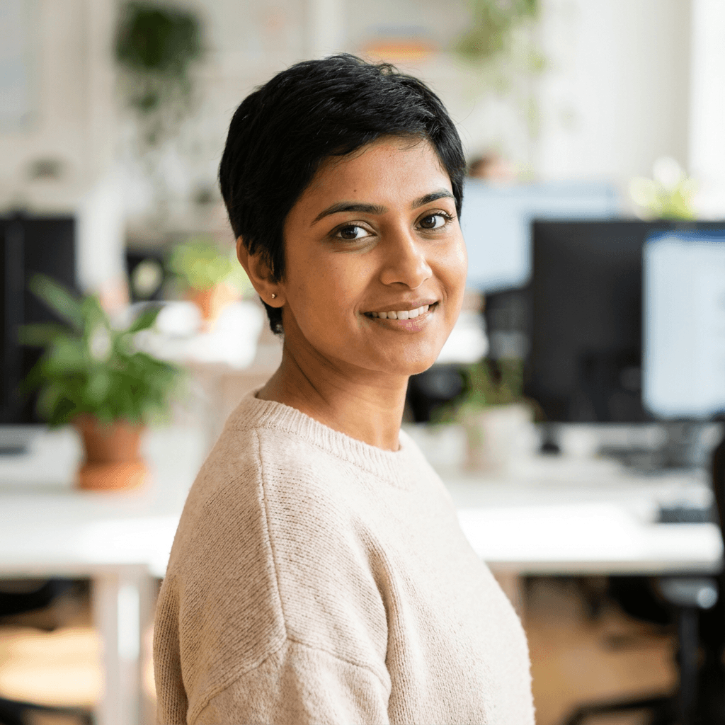 Female commuter in her late 20s, South Asian, casual friendly appearance
